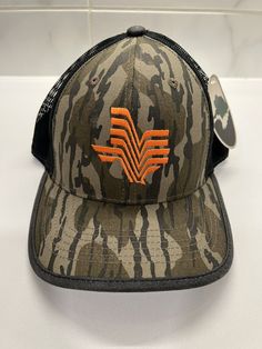 Get your hands on this rare Mossy Oak Whatatexas Whataburger Camo Trucker Adjustable Cap Hat. Perfect for casual occasions, this hat features a camouflage pattern with the iconic Whataburger logo on the front. It is made of durable polyester material and comes in one size that fits all. The hat also has an adjustable feature that allows you to customize the fit according to your preference. This Trucker Hat is a must-have for any collector or fan of Mossy Oak and Whataburger. Don't miss the chance to own this unique item. Camo Hat, Camo Hats, Mossy Oak, Polyester Material, Hands On, Camouflage, Caps Hats, Trucker Hat, Camo