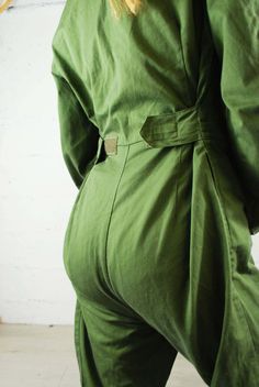 "Fantastic vintage utility workwear jumpsuits from the British Army. Unisex garments, made for men but we have the rare smaller sizes too which are perfect for women. - Tough overalls made for the military - built to last - 2 hip pockets (may have additional) - Made from a quality polyester cotton blend - Velcro front makes them easy to take on and off (some blue may have zips instead) - Ideal for many projects: industry personnel, technicians, mechanics, DIY jobs or fashion - Can be tightened a Utility Jumpsuits And Rompers For Workwear, Military Style Cotton Overalls, Military Style Long Sleeve Cotton Jumpsuit, Military Style Long Sleeve Cotton Jumpsuits And Rompers, Military Style Jumpsuits And Rompers With Pockets, Fitted Utility Overalls For Workwear, Solid Workwear Overalls With Side Pockets, Fitted Solid Overalls With Pockets, Fitted Overalls With Pockets