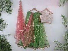 Custom made Lehenga Choli dupatta.  Plus size available at a small up-charge. Size: This is custom made outfit as per your size. Post your order we will send you a measurements reference sheet using which you can provide details required to make your outfit with best fit. Fabric and work: Lehenga - Embroidered net. Blouse - Embroidred brocade. Dupatta - Premium net Delivery time: This lehenga set will take 2-3 weeks to produce after we have received your sizing details. Don't worry it can be made sooner too, just keep us informed, we will process it accordingly and deliver on or before a delivery date we discuss. Disclaimer: Color may slightly vary due to digital photography and display screen settings. Laces and trims may change based on availability. shown in the picture. Unstitched Festive Lehenga With Sheer Dupatta, Unstitched Lehenga With Sheer Dupatta For Festive, Unstitched Pista Green Lehenga For Festive Occasions, Unstitched Pista Green Lehenga For Eid, Unstitched Pista Green Chanderi Lehenga, Unstitched Festive Pista Green Lehenga, Festive Unstitched Pista Green Lehenga, Festive Fitted Pista Green Lehenga, Semi-stitched Chanderi Lehenga With Gota Work