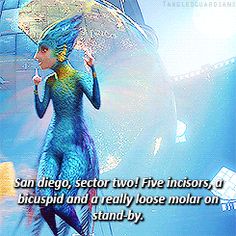 a woman holding an umbrella in front of a blue background with the words san diego sector two - five inclos