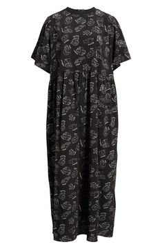 This soft T-shirt maxi is crafted in an oversized silhouette with an allover print and elbow-length sleeves. Crewneck Elbow-length sleeves Lined 100% polyester Hand wash, line dry Imported Printed Short Sleeve Loungewear Dress, Casual Oversized Printed Dresses, Casual Graphic Print Loungewear Dress, Casual Graphic Print Dress In Relaxed Fit, Casual Graphic Print Dress With Relaxed Fit, Casual Relaxed Fit Dress With Graphic Print, Oversized Graphic Print Short Sleeve Dress, Oversized Printed Black Dresses, Relaxed Fit Graphic Print Dress With Crew Neck