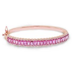 Gorgeous Bangle Bracelet Featuring 25 Natural Oval Pink Sapphires Set Into Four-Prong Setting. The Pink Sapphires Are Surrounded For 164 Round Cut Diamonds Set Into Pave- Setting. All Set In A 14KT Rose Gold. This Item Is Made-To-Order. Please Allow Up To 10 Business Days To Make It. Pink Gold Formal Fine Jewelry Bracelets, Pink Gold Formal Bangle Jewelry, Formal Pink Bracelets In Fine Jewelry Style, Formal Pink Gold Bangle Jewelry, Formal Pink Gold Bangle, Pink Fine Jewelry Bracelet For Formal Occasions, Pink Fine Jewelry Bracelets For Formal Occasions, Pink Bracelets For Formal Occasions, Pink Bangle Fine Jewelry