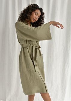 Spoil yourself with a linen bathrobe that's incredibly soft, light, and breathable. Handcrafted of premium quality European linen, this moss green kimono-style bathrobe feels so good to the skin, you'll never want to take it off. The linen robe features a relaxed fit, long sleeves, an adjustable waistband, and comfy outer pockets, making it the ultimate addition to your at-home wear. The model is 175 cm (69'') tall and is wearing a bathrobe in size S/M. DETAILS - Handmade from high-quality Europ Relaxed Fit Linen Robe For Daywear, Relaxed Fit Linen Robe For Spring, Green Spring Robe For Loungewear, Oversized Linen Summer Kimono, Relaxed Fit Linen Kimono For Daywear, Summer Oversized Linen Kimono, Green Spring Loungewear Robe, Summer Linen Robe For Relaxation, Spring Linen Loungewear Robe