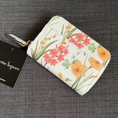 Brand New With Tag Hard To Find Nanette Lepore Small Wallet Cardholder Faux Leather Multicolor Botanical Floral Design Gold Hardware Logo Lettering On The Front Zip Coin Compartment Six Credit Card Slots Approximately 4.5” X 3.25” Pet & Smoke Free Home Please See My Entire Collection Travel Pouch Card Holder, Orange Rectangular Coin Purse For Daily Use, Orange Pouch Wallet For Daily Use, Orange Travel Wallets With Interior Card Slots, Orange Rectangular Wallet With Interior Card Slots, Orange Rectangular Wallets With Interior Card Slots, Orange Wallet With Card Slots For Daily Use, Spring Bags With Card Slots For Daily Use, Spring Daily Use Bags With Card Slots