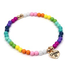 What's their favorite color? All of them? We have just the thing! A Rainbow Beaded Stretch Bracelet, perfect for charming and stacking. Add charms to this bracelet and customize their collection! 4mm beads on 6" length bracelet WARNING: Choking Hazard - Small parts. Not for children under 3 years. Charm It, Beads Bracelet Design, Heart Chain, Rainbow Beads, Pony Beads, Beaded Stretch Bracelet, Precious Jewelry, Diy Beads, Bead Bracelet