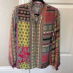 Gorgeous Johnny Was Silk Blouse. Size Medium. New, With Tags, In Original Bag. Accidentally Ordered 2. Have Matching Joggers As Well. Bohemian Multicolor Blouse For Workwear, Bohemian Multicolor Blouse For Work, Multicolor V-neck Workwear Blouse, Multicolor V-neck Blouse For Work, Long Sleeve Tops With Vibrant Print For Work, Red Bohemian Blouse With Vibrant Print, Multicolor Bohemian Tops For Work, Bohemian Multicolor Tops For Work, Spring Red Blouse With Colorful Pattern