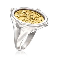 a ring with a gold coin in it