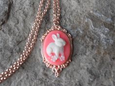 Beautiful bunny cameo necklaces!!!  The cameos are gorgeous!!!  I do have other colors and styles, so please do browse, I can make any cameo in my shop into this pretty necklace, so browse and message me with a custom order!!!  The pretty setting is about 1 1/2" long, please do see the photo!!!  The popular chain is a matching antiqued 20" rose gold plated rolo link chain with a lobster claw clasp, if you would prefer a different length, please leave a message at checkout.   Perfect for Brides o Pink Cameo Necklace For Gifts, Easter Clothes, Easter Necklace, Bunny Necklace, Easter Jewelry, Unique Easter, Bunny Lovers, Cameo Necklace, Pin Pendant