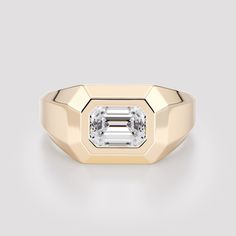 "Men natural diamond signet / pinky ring made from 14K yellow gold. A modern geometric ring with a faceted structure set with a gorgeous emerald cut diamond. Personalized signet ring, free engraving can be added by choice. Available also with different center stones - please see all options and quoting in the drop down menu above. **Please note that personalized items can not be returned or exchanged. Thank you for your understanding.  Ring description: * Top width: approx. 0.41\" / 10.3 mm. * B Signet Pinky Ring, Custom Signet Ring, Pinky Signet Ring, Gem Tones, Faceted Ring, Geometric Ring, Colombian Emeralds, Men Ring, Gold Geometric