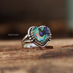 Abalone Shell Ring, Heart Shape Ring, 925 Sterling Silver Ring, Unique Ring, Handmade Ring, Silver Artisan Ring, Wedding, Gift For Her Metal: 925 Sterling Silver Gemstone : Abalone Shell  Stone Color : Multi Stone Shape : Heart Stone Setting: Bezel Benefits of wearing Rainbow moonstone:- Rainbow moonstone is thought to bring balance, harmony and hope while enhancing creativity, compassion, endurance and inner confidence. Rainbow moonstone is believed to help strengthen intuition and psychic perc Handmade Silver Heart Ring For Anniversary, Unique Heart Shaped Jewelry For Promise, Unique Heart Shaped Promise Jewelry, Unique Heart-shaped Promise Jewelry, Unique Rings For Wedding On Valentine's Day, Unique Sterling Silver Heart Ring, Handmade Silver Heart-shaped Rings, Handmade Silver Heart Rings, Handmade Sterling Silver Heart Ring For Promise