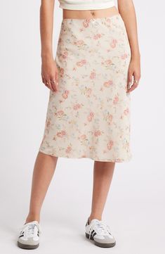 Delicate blooms dapple a gently flounced skirt that's easy to style up or down. Elastic waist Lined 100% polyester Machine wash, dry flat Imported Not available for sale and shipment to Germany Spring Floral Print Skirted Bottoms, Spring Floral Print Bottoms For Garden Party, Feminine Long Skirt With Floral Print, Feminine Beige Floral Print Bottoms, Feminine Beige Bottoms With Floral Print, Cream Floral Print Bottoms For Spring, Spring Floral Print Cream Bottoms, Feminine Floral Print Bottoms For Spring, Feminine Floral Print Spring Bottoms