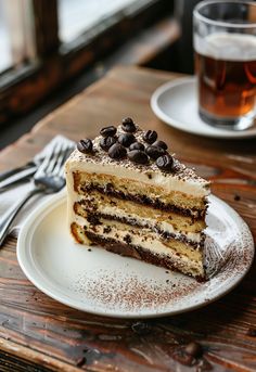 a piece of cake sitting on top of a white plate