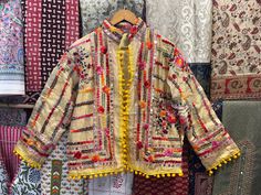 Handmade Item  Indian Women's Phulkari Embroidered Stylish Designer Jacket, Indian Handmade Embroidery Jacket, Traditional Festival Kutch Banjara Jacket Woman's jacket cotton Designer embroidery. This jacket was hand-made with vintage style phulkari embroidery by artisans from the nomadic desert tribe known as "Banjara ", in the Northern India. The Jacket is no closure pattern with Long Sleeves and Vibrant Color Item Detail - Material :- Cotton With Thread Work And Sequence. Length :- 24" Inches Fall Multicolor Embroidered Nehru Jacket, Traditional Outerwear With Resham Embroidery For Spring, Traditional Spring Outerwear With Resham Embroidery, Traditional Nehru Jacket With Embroidered Border For Spring, Nehru Jacket With Multicolor Resham Embroidery For Fall, Spring Traditional Wear With Multicolor Embroidery And Long Sleeves, Multicolor Resham Embroidered Nehru Jacket For Fall, Fall Nehru Jacket With Multicolor Resham Embroidery, Bohemian Long Sleeve Traditional Wear For Spring