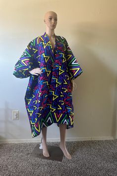 Discover bold styles with our ready-to-wear one-size-fits-all Quality African Print Kimonos, Handmade from premium cotton and perfect for all events. Multicolor Kimono With Kimono Sleeves, Multicolor Print Kimono With Vibrant Print And Kimono Sleeves, Multicolor Cotton Outerwear With Kimono Sleeves, Oversized Printed Outerwear With Kimono Sleeves, Oversized Long Sleeve Cotton Kaftan, Patterned Kimono With Vibrant Print, Oversized Multicolor Kaftan With Kimono Sleeves, Patterned Cotton Kimono With Kimono Sleeves, Multicolor Cotton Kimono With Kimono Sleeves