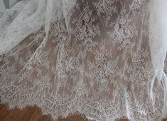 Off White/Black Chantilly Lace, Both Scalloped Border Lace Fabric, Soft Eyelash Edging Lace Fabric.     Wide : 150cm.  Price is for 3 Yards long.We will ship in 2 or more pieces if order more than 1 quantity due to 3 yards is the longest unit in continue piece. Fabric in elegant and romantic. It can be used for bridal veils, wedding dress, scraf, shawl, table cloth and etc.We offer special discounts for designers and wholesale orders!My shop link,https://www.etsy.com/shop/lacejamila?ref=search_s Veils Wedding, Border Lace, Diy Wedding Dress, Scalloped Border, Bridal Lace Fabric, Alencon Lace, Bridal Fabric, Bridal Veils, Sewing Material