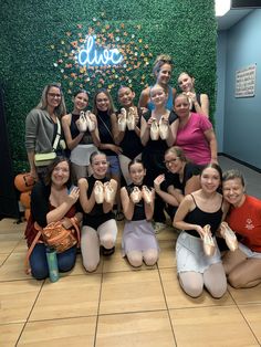 a group of young women posing for a photo