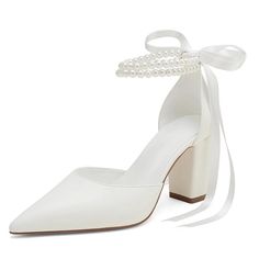 a white high heeled shoe with pearls on the ankle and a bow at the side