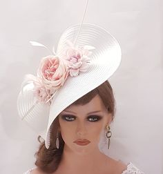 Large White  Hat Fascinator with long Quill Feather and  Shade of light PINK Flowers, perfect for Mother of Bride or Goom, Royal Ascot, Kentucky Derby, Weddings Goodwood revival, Christening, Ascot or any special occasion. Gorgeous White and  Light shade of pink floral straw weave Hat fascinator long quill feather and  Silk flowers This can be made with feathers or without feathers ( Without long quill feather and small feathers or just with the samall feathers or just with long quill feather. P White High Crown Costume Hat For Races, White High Crown Fascinator For Races, White Fitted High Crown Fascinator, White High Crown Adjustable Fascinator, White High Crown Costume Hat For Spring, White Brimmed Fascinator For Church, Adjustable White Fascinator For Garden Party, High Crown Fascinator For Kentucky Derby And Wedding, White High Crown Fascinator For Spring