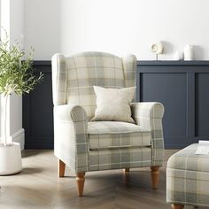 a chair and ottoman in a living room