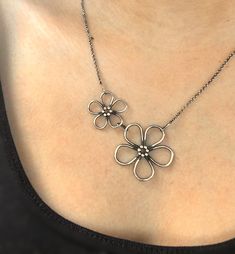 This is a handmade Sterling silver flower necklace, inspired by one of my bestselling flower rings. It features a large flower and a smaller one, attached to a sturdy yet delicate, adjustable Sterling silver chain. This necklace is handmade to order and is not duplicated from a mold. Each piece is handcrafted individually, and blackened for extra dimension. The smaller and larger flower make this necklace a great mother/ daughter gift. 🥰 You'll love this piece if you like: - handmade jewelry - Sterling Silver Jewelry With 3d Flowers In Silver, Adjustable 3d Flowers Jewelry, Sterling Silver Jewelry With 3d Flower Design, Silver Jewelry With 3d Flowers For Gift, Adjustable Flower Necklace Nickel Free, Adjustable Sterling Silver Necklace With Flower Charm, Minimalist Silver Flower Charm Necklace, Nickel Free Flower Shaped Necklace, Adjustable Nickel-free Flower Necklace