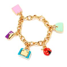 Displaying purses, a clutch and even a ladybug, this darling VOGA Collection charm bracelet will be an instant favorite. The colorful enamel charms are sure to make you smile! Crafted in 18K yellow gold over resin, the oval links have a a bright polished finish. The electroform process allows for a lightweight feel on your wrist for comfortable all-day wear. It's available in your choice of size - 7.75" or 8" - and safely secures with a lobster clasp. Luxury Multicolor Enamel Jewelry, Designer Enamel Jewelry As A Gift, Designer Enamel Jewelry For Gift, Designer Gold-tone Bracelets For Gift, Luxury Charm Bracelet With Logo Charm As Gift, Luxury Logo Charm Bracelet As Gift, Luxury Removable Charms For Gifts, Trendy Yellow Gold Enamel Jewelry, Designer Multicolor Jewelry For Gifts