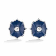 A pair of platinum Mini Lotus ear clips each centered upon a round brilliant-cut colorless diamond set in matte blue ceramic with a colorless diamond micropavé surround. Luxury Blue Platinum Earrings, Luxury Platinum Blue Earrings, Elegant Blue Platinum Earrings, Classic Blue Platinum Earrings, Luxury Blue Diamond Earrings With Brilliant Cut, Luxury Blue Diamond Earrings, Luxury Blue Diamond Earrings With Accents, Luxury Blue Diamond Earrings For Formal Occasions, Luxury Blue Diamond Earrings For Formal Events