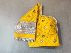 Add yellow embroidered designer saree blouse with mirror work and lace border with sweetheart neckline. Buy readymade saree blouse in USA from Pure Elegance.. Disclaimer: The actual product may vary slightly from the image. These are custom orders, hence expect slight variation in color, placement of the motif or buta. ESTIMATED DELIVERYBecause this is a custom order, it would take about 2 weeks from the date of purchase. RETURN POLICY: This product is a custom order and cannot be returned or exchanged. Blouse With Mirror Work, Sweetheart Neckline Long Sleeve, Banarasi Sari, Designer Saree Blouse, Blouse Sari, Saree Blouses Online, Readymade Saree, Bangle Ring, Pure Elegance