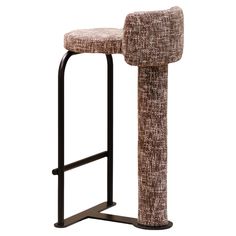 a tall stool with a foot rest on it's legs and a black metal frame