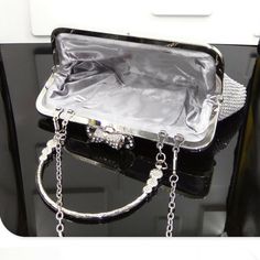 Item Type: Bags Material: Satin Lining Material: Polyester Length: 24 cm Width: 5 cm Height: 13 cm Decorations: Sequined Style: Evening Bags Clasp Type: Hasp Features: Bags, Women’s Bags, Luxury Bags, Evening Bags, Fashion Bags Silver Handheld Bag With Chain Strap, Rectangular Silver Evening Bag, Silver Bags With Detachable Handle For Events, Silver Event Bag With Detachable Handle, Silver Event Bags With Detachable Handle, Silver Large Capacity Shoulder Bag For Party, Silver Large Capacity Shoulder Bag For Evening, Silver Evening Shoulder Bag With Large Capacity, Silver Rectangular Portable Shoulder Bag