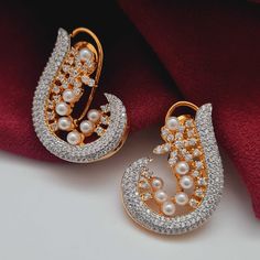 Experience the perfect combination of timeless elegance and modern sophistication with our Veda AD Earrings from the Royal Heritage Collection. Meticulously crafted in the USA and intricately detailed in India, this piece embodies opulence and grace, making it a must-have in our luxurious collection. Its lightweight and versatile design adds a touch of regal allure to any ensemble, elevating your style and completing the regal line. Handcrafted Metal: Metal Alloy, Gold Plated Stone: American Dia Formal Bridal Earrings With Cubic Zirconia, Formal Cubic Zirconia Bridal Earrings, Fine Jewelry Teardrop Bridal Earrings With Elegant Design, Teardrop Bridal Earrings With Elegant Design, Exquisite Bridal Earrings For Formal Occasion, Exquisite Formal Bridal Earrings, Luxury Earrings For Receptions, Luxury Earrings For Reception, Elegant Fine Jewelry Earrings For Formal Occasions