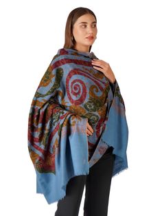 Experience the epitome of elegance and comfort with our Stylish Blue Pashmina Shawl, adorned with an intricate paisley design. This shawl is meticulously crafted from the finest Kashmiri pashmina, offering a luxurious blend of sophistication and timeless beauty. Product Details: Material: Pure Pashmina (100% Cashmere) Size: 100 cm X 203 cm / 40 Inch X 80 Inch / 1.1 x 2.2 Yards (Approx) Base Color: Blue Design: Intricate paisley pattern Origin: Handcrafted in Kashmir by skilled artisans Embroider Elegant Blue Paisley Print Scarves, Winter Pashmina Scarf With Paisley Print, Winter Paisley Print Pashmina Scarves, Winter Paisley Print Pashmina Scarf, Winter Pashmina Shawl With Paisley Print, Winter Paisley Print Pashmina Shawl, Pashmina Shawl With Paisley Print, Elegant Blue Shawl With Paisley Print, Elegant Blue Pashmina Shawl