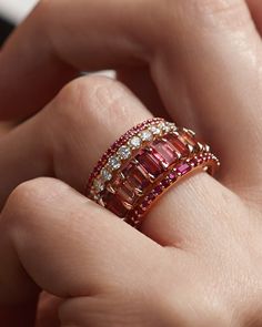 A luminous ring, with rubies. A unique stacking ring, a subtle wedding band, or a wedding band and engagement ring all in one.