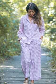 There is a lot to love about these chequered pyjama set,if you are fan of Japanese design then these pjs will not disappoint you! Made with the softest organic cotton. The arm and leg length is shorter than more conventional pjs but they look fabulous and quirky. The top has a boxy body with 3/4 wider sleeves and trousers are cropped slightly above the ankle length. Organic cotton is so soft and is known for its breathable and lightweight quality keeps you cool in summer and toasty in winter Features  - Pure soft cotton  - Vegan product  - Lightweight and breathable  - Elastic waist with drawstring  - Button closure  - Straight full length trousers  - Gorgeous print available in two colours  - Generously sized for comfort  - Washes and dries quickly  - Ethically made in India - Machine was Cotton Sleepover Sets For Summer, Cotton Relaxed Fit Sleepwear For Sleepovers, Relaxed Fit Cotton Sleepwear For Sleepover, Comfortable Summer Sets For Pajama Party, Cotton Sleep Sets With Long Pants, Cotton Sleepwear For Summer, Cotton Sleepwear Long Pants For Spring, Pink Cotton Relaxed Fit Sets, Comfortable Pajama Party Sets With Long Pants