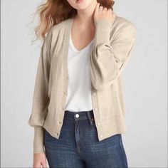 This Classic Yet Fashionable Button Down Cardigan Is Perfect For Cool Summer Night Or Fall. It Features V-Neck With Long Balloon Sleeves With Rib-Knit Cuffs, Rib-Knit Hem And Button-Front (Button Color Same As Material).Straight Silhouette With An Easy Fit That Hits At The Hip. 100% Merino Wool Color: Oatmeal Heather (Similar To Tan). Gap Everyday Outerwear With Button Closure, Classic Gap Cardigan For Fall, Everyday Fall Outerwear By Gap, Classic Gap Fall Cardigan, Gap Fall Outerwear For Everyday, Gap Everyday Button-up Outerwear, Versatile Button-up Cardigan, Gap V-neck Fall Sweater, Classic Everyday Outerwear By Gap