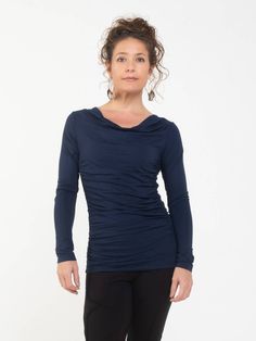 Ruched side panels create a flattering silhouette on one of our best selling long sleeve tops. It features a slightly draped neckline and hit just below the waist. [#details] Size Suggestions S: 2-4 M: 6-8 L: 10-12 [/details] [#fabric] Rayon Lycra: 90% Rayon (Viscose) / 10% Spandex (Lycra) [/fabric] Fitted Ruched Long Sleeve Casual Top, Casual Fitted Long Sleeve Ruched Top, Casual Fitted Ruched Long Sleeve Top, Ruched Fitted Long Sleeve Top For Fall, Stretch Ruched Tops For Fall, Fitted Ruched Tops For Fall, Long Sleeve Ruched Blouse For Fall, Versatile Long Sleeve Ruched Top, Fitted Tops With Ruched Sides For Fall