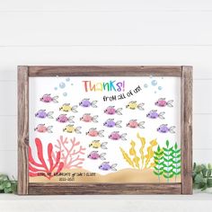 a wooden frame with an under the sea scene and words on it that says thank from all of us