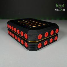 two black and red dices sitting on top of each other