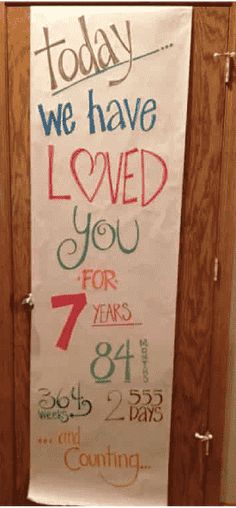 a sign that says today we have loved you for seven years