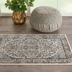 Create a more inviting atmosphere with our Gray and Ivory Nadia Medallion Area Rug! Your family will love the charmingly bohemian design and the cozy cut and loop pile. Rug measures 2 ft. in length x 4 ft. in height; pile height measures 0.32 in. Crafted of 80% polypropylene and 20% polyester with latex backing Power-loomed construction Features an medallion design Hues of gray, tan, and cream Dense, cut and loop pile Rug pad not included Care: Vacuum regularly without beater bar. Blot spills wi Gray And Beige Bathroom, Alexander Home, Medallion Area Rug, Persian Design, Perfect Rug, Beige Area Rugs, Indoor Rugs, Online Home Decor Stores, Contemporary Decor