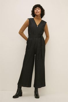 Style: JumpsuitFabric: DenimLength: CroppedSleeve Length: Sleeveless Oasis Fashion, Sleeveless Jumpsuits, Black Jumpsuit, Fashion Face, Quick Delivery, Black Denim, Oasis, Buy Online, Jumpsuit