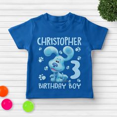 Blues Clues Birthday Shirt, Blue Dog Family Shirt, Blue Dog Family Matching Birthday Shirt, Birthday Boy Shirt Family Party Shirt CYH525 👏CONGRATULATIONS You have found an online shop with reasonable prices, amazing quality, and fast shipping  We offer shirts for VACATIONS, HOLIDAYS, EVENTS, FAMILY REUNIONS, BIRTHDAYS, MOTHER'S DAY, FATHER'S DAY, GRADUATIONS, FUNNY T-SHIRTS as well as CUSTOM T-SHIRTS.  💖Description💖  --About this T-shirt--  👉Our Adult Unisex T-Shirt brand is BELLA CANVAS Ava Blue Short Sleeve T-shirt For First Birthday, Blue Crew Neck T-shirt For First Birthday, Blue Graphic Print T-shirt For First Birthday, Blue Letter Print T-shirt For Birthday, Blue Letter Print Top For Birthday, Blue Crew Neck Top For First Birthday, Blue Crew Neck Top For Birthday, Blue Graphic Print Tops For Birthday, Blue Short Sleeve Tops For Birthday