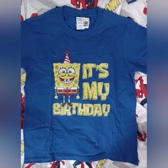 New, T-Shirt Happy Birthday Spongebob Theme Youth Size Medium Novelty Graphic Print T-shirt For Birthday, Fun Blue T-shirt With Character Print, Novelty Graphic Print Birthday T-shirt, Novelty Birthday T-shirt With Crew Neck, Casual Blue Birthday Tops, Fun Blue Pre-shrunk T-shirt, Funny Blue Tops For Birthday, Funny Blue T-shirt With Character Print, Funny Blue T-shirt With Cartoon Print