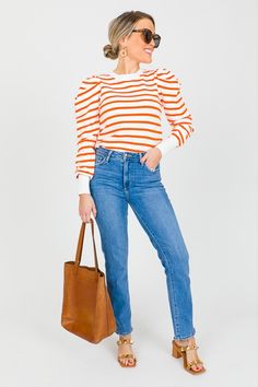 Talk about a totally adorable sweater! Puffed long sleeves give this orange striped sweater an extra sweet push. Knit Tops With Striped Long Sleeves, Chic Orange Long Sleeve Sweater, Trendy Sweater With Striped Sleeves For Fall, Stripes Sweater Outfit, Stripe Sweater Outfit, Orange Striped Sweater, Striped Sweater Outfit, Stripes Sweater, Puffed Long Sleeves