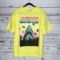 Zara Jaws Size M Pastel Yellow Jaws Shark Movie Limited Edition 1259/406/321 T-Shirt. Short Sleeves. 100% Cotton. Nwt, Brand New With Tags. Pacsun Graphic Tees, Jaws Shark, Mickey Mouse Shirts, Zara T Shirt, Linen Tshirts, Embroidered Tee, White Crew Neck, Zara Shirt, Pastel Yellow