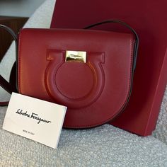 New Made In Italy Box, Tag And Dust Included Strap It’s Adjustable 6.2 X 2 X 7 Aprox Really Nice Leather Red Calf Leather Bag With Detachable Strap, Red Calf Leather Office Bag, Designer Red Business Shoulder Bag, Designer Red Shoulder Bag For Business, Red Bag For Everyday Use, Red Calf Leather Bag For Business, Elegant Red Calf Leather Shoulder Bag, Red Calf Leather Business Bags, Red Calf Leather Travel Bags