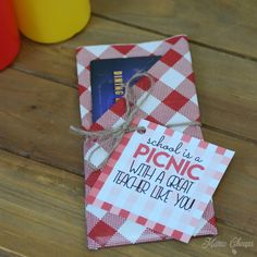 a red and white checkered paper bag with a note attached to it that says, alcohol is a picnic with a great idea like you