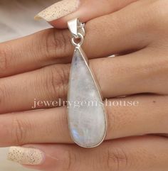 Rainbow Moonstone Pendant, 925 Sterling Silver Pendant, June Birthstone Pendant, Gemstone Necklace, Handmade Jewellery, Pear Shaped Pendant. Gemstone Name- Rainbow Moonstone Stone quality - AAA Pendant size - Height - 5 cm, Width - 1.5 cm  Pendant weight - 8.38 grams Stone Shape - As shown in the picture The Height of the pendant including the loop is 5 cm  18 inch Chain - The total length of the chain is 18 inch including a 2-inch adjustable chain. So you can adjust the chain from 16 inches to 18 inches. You adjust the chain by placing the lock on the adjustable chain as per your requirement. The motive of adding a 2 inch adjustable is to give our buyers an option to flaunt with different pendants in different ways. Chain Weight - 3 grams  The Pendant and the chain are stamped 925 which s Artisan Teardrop Moonstone Jewelry, Sterling Silver Teardrop Pendant Jewelry With Stones, Sterling Silver Teardrop Pendant With Stones, Sterling Silver Untreated Teardrop Pendant, Untreated Moonstone Jewelry For Anniversary, Artisan Moonstone Jewelry For Anniversary, Sterling Silver Teardrop Jewelry, Sterling Silver Teardrop Stones Jewelry, Handmade Moonstone Teardrop Pendant Jewelry