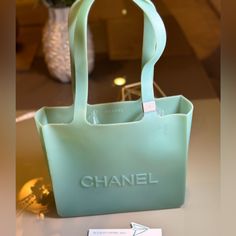 Chanel Turquoise Jelly Tote Good Use Condition With Visible Stains Inside And Outside Of The Bag. Please See Pictures For Details. No Any Rips Or Tears On Handles. Crafted In Rubber Material. Measurements In Cm : 24.5x 7 X 21.Shoulder Strap 21.5 Cm Great Summer Beach Bag With Silver Hardware. Summer Beach Bag, Chanel Bags, Rubber Material, Silver Hardware, Beach Bag, Chanel Bag, Summer Beach, Jelly, Shoulder Strap