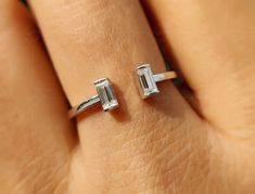 💢 𝐈𝐭𝐞𝐦 𝐃𝐞𝐬𝐜𝐫𝐢𝐩𝐭𝐢𝐨𝐧 💢 Baguette Open Cuff Ring Women / Two Stone Open Gap Wedding Band / Moissanite Stackable Rings / Minimalist Stacking Ring / Toi Et Moi Ring 💢 𝐀𝐕𝐀𝐈𝐋𝐀𝐁𝐋𝐄 𝐌𝐄𝐓𝐀𝐋𝐒 💢 ✶ Solid 925 Sterling Silver, Solid 10K, 14K, 18K White, Yellow & Rose Gold 💢 𝐒𝐓𝐎𝐍𝐄 💢 ✶ Stone Shape : Baguette Cut ✶ Stone Type : Moissanite  ✶ Moissanite Color : Near Colorless (F /G) ✶ Moissanite Clarity : VVS1   💢 𝐓𝐎𝐓𝐀𝐋 𝐂𝐀𝐑𝐀𝐓 𝐖𝐄𝐈𝐆𝐇𝐓 💢 ✶ Total Carat Weight : 0 Gap Wedding Band, Mothers Ring Stackable, Music Rings, Open Cuff Ring, Rings Minimalist, Ring Enhancer, Cuff Ring, Solid Gold Band, Mother Rings