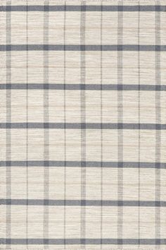 a white and grey plaid fabric with some black lines on it, as well as the background